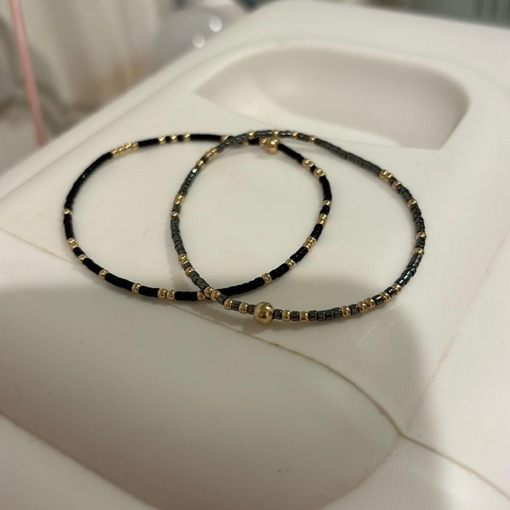 black and grey e newton bracelets